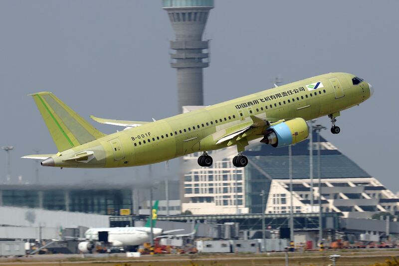 国产大型客机C919第五架试飞飞机，于2019年在上海浦东国际机场试飞。（路透社图片）