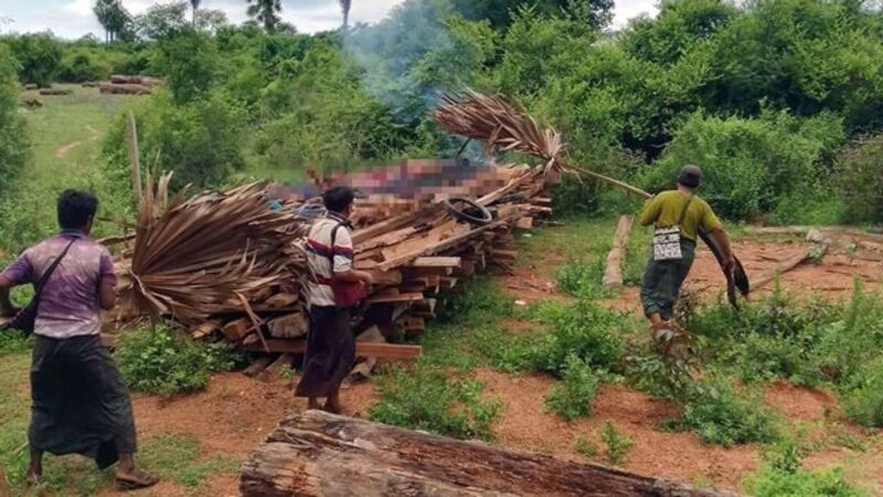 Residents prepare to cremate some of the civilians killed by junta troops in Sone Chaung village, Yinmarbin township, northwestern Myanmar's Sagaing region, July 21, 2023. Credit: Citizen journalist