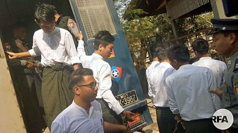 Myanmar students from Yadanabon University arrive for their trial on charges of arson and protesting without official permission at a courthouse in Amarapura township, central Myanmar's Mandalay region, Feb. 13, 2019.