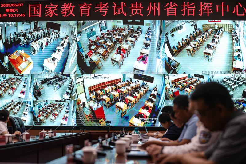 Staff members of the Educational Enrollment and Examination Center monitor the first day of national college entrance exam on June 7, 2025 in Guiyang, Guizhou Province of China.